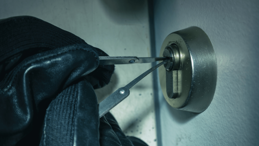 Burglar Picking Door Lock