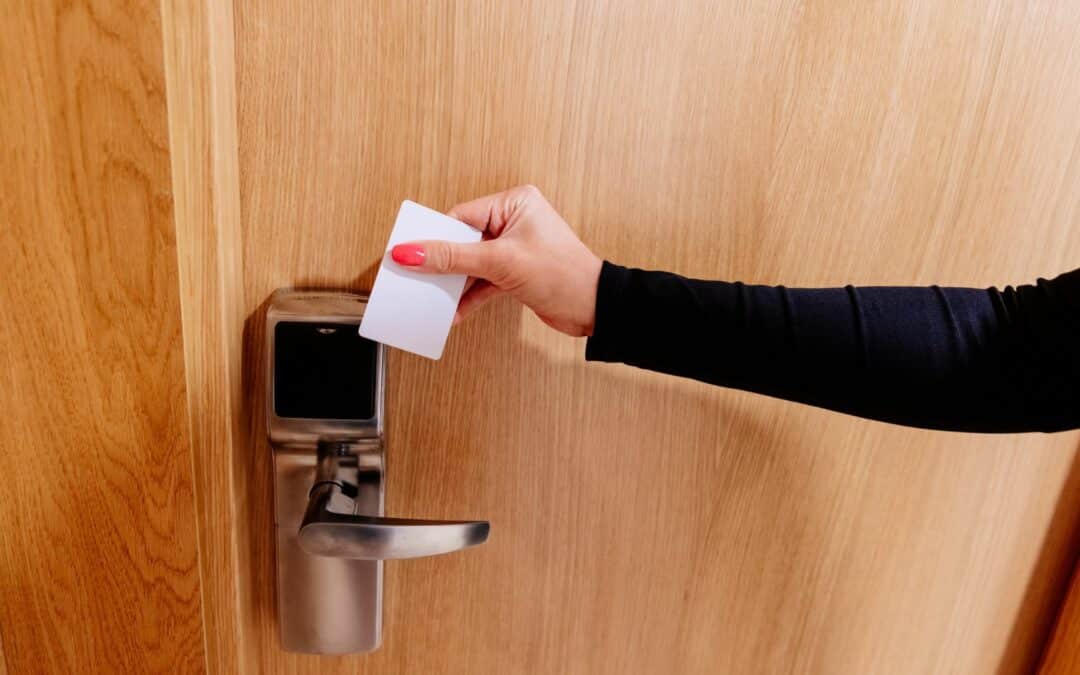 Someone using a keycard to enter a hotel room who has learned how to secure a hotel room door