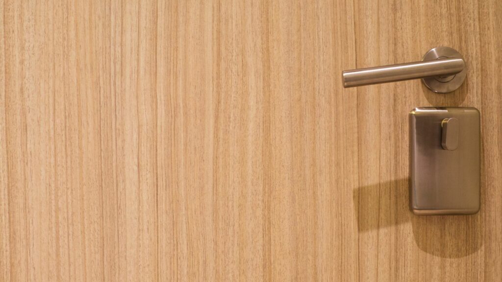 A hotel door that the occupant can use to learn how to secure a hotel room door
